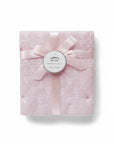 Stork And Baby Mothers Choice soft pink knitted baby shawl with cable pattern, tied with a satin ribbon.