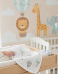 Stork And Baby 2 pack muslin bibs with hot air balloon print. Soft, breathable, and absorbent for baby.