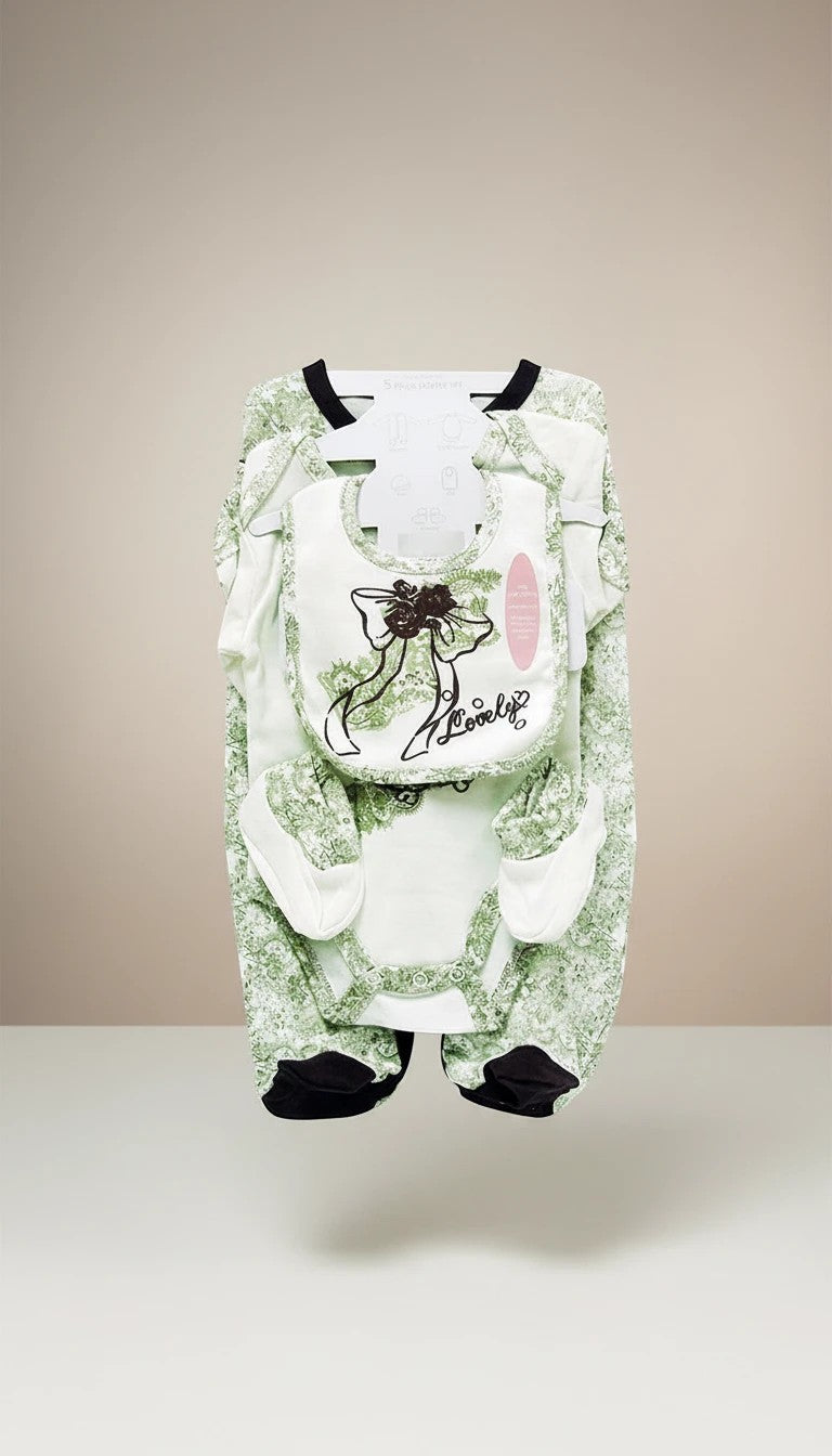 Stork And Baby 5-piece newborn starter set in light green with a floral pattern, featuring a babygrow, onesie, bib, and mittens with a bow detail.