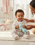 Stork and Baby Mothers Choice Quilted Grower 'Forest Fantasy' baby outfit with woodland print, brown trim, and a baby holding a blue plush toy.