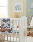 Stork And Baby Mothers Choice Sherpa Fleece Stars Blanket Blue, a soft grey blanket with white stars and polka dots, trimmed with white sherpa fleece.