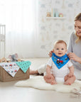 Stork And Baby boys' blue tractor bandana bib with red tractor graphic and white lettering. Soft cotton for feeding.