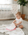 Stork And Baby 3 pack triangle bibs in pink and white with heart pattern, soft cotton for baby feeding and drool.