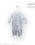 Stork And Baby white long-sleeve babygrow with snap closures and footies. Soft cotton for comfort.