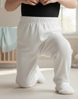 Stork And Baby white 100% cotton baby leggings with a comfortable stretchy fit, perfect for play and sleep.