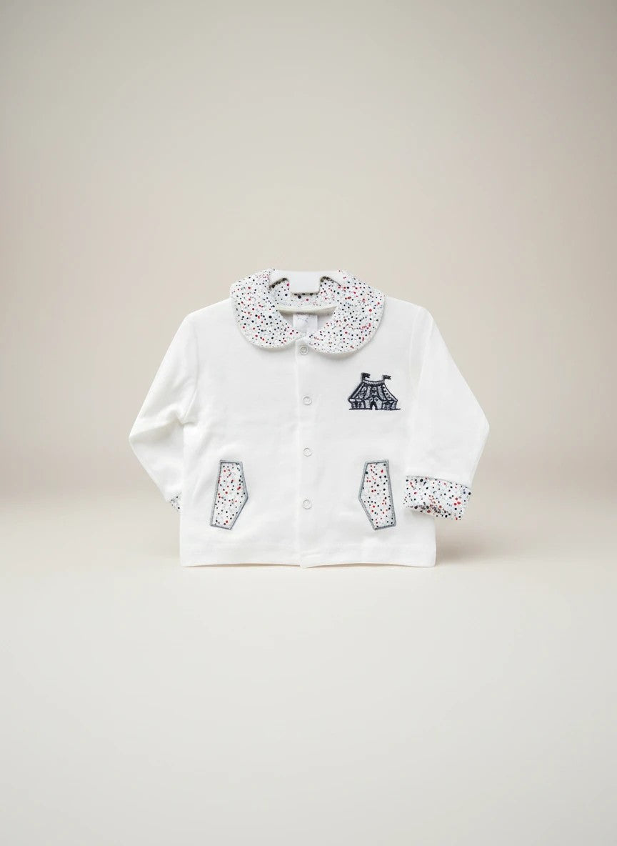 Stork And Baby white 100% cotton long sleeve baby jacket with circus tent embroidery and confetti print collar and cuffs.