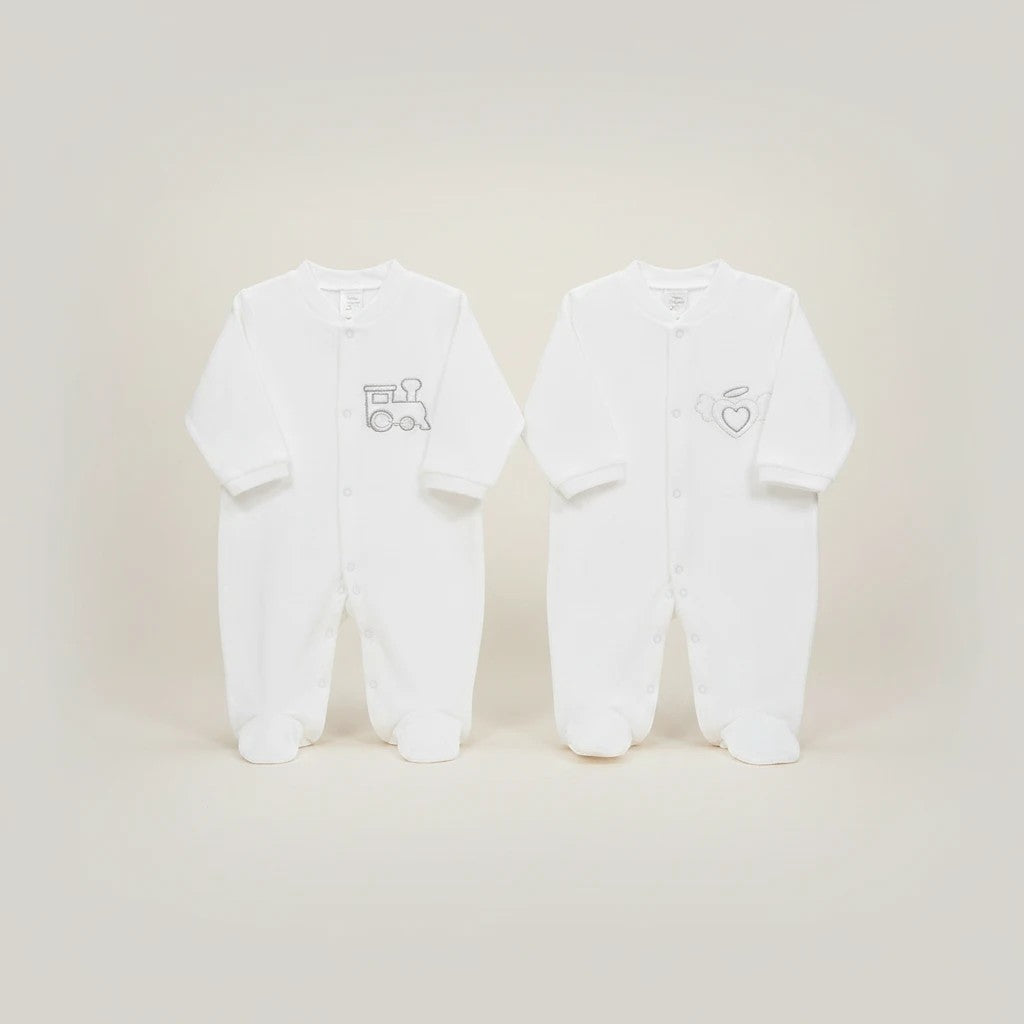 Stork And Baby white cotton footed pajamas with silver train and heart embroidery. 6-9 months.