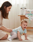 Stork And Baby white lace leggings for infants, soft stretchy fit with delicate timeless charm.