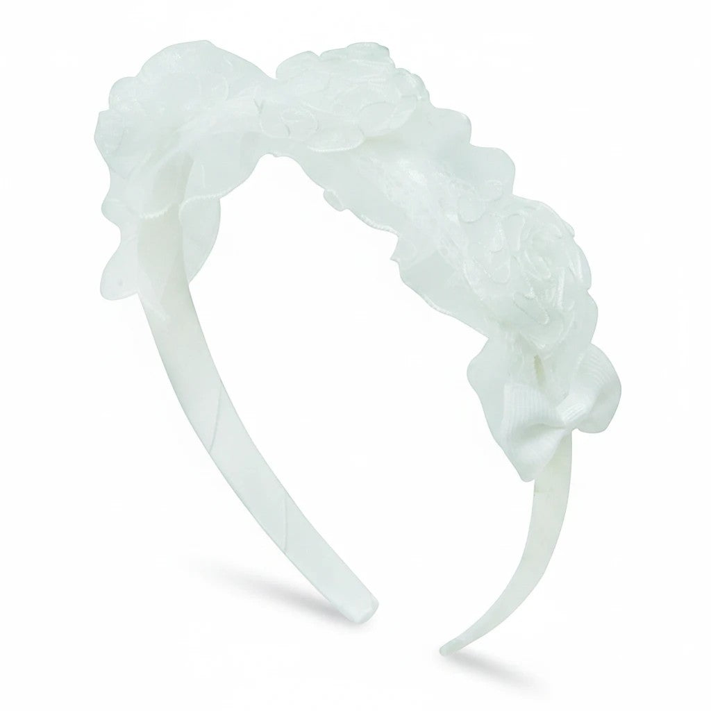 Stork And Baby white girls alice band featuring organza roses and decorative bows for formal occasions.