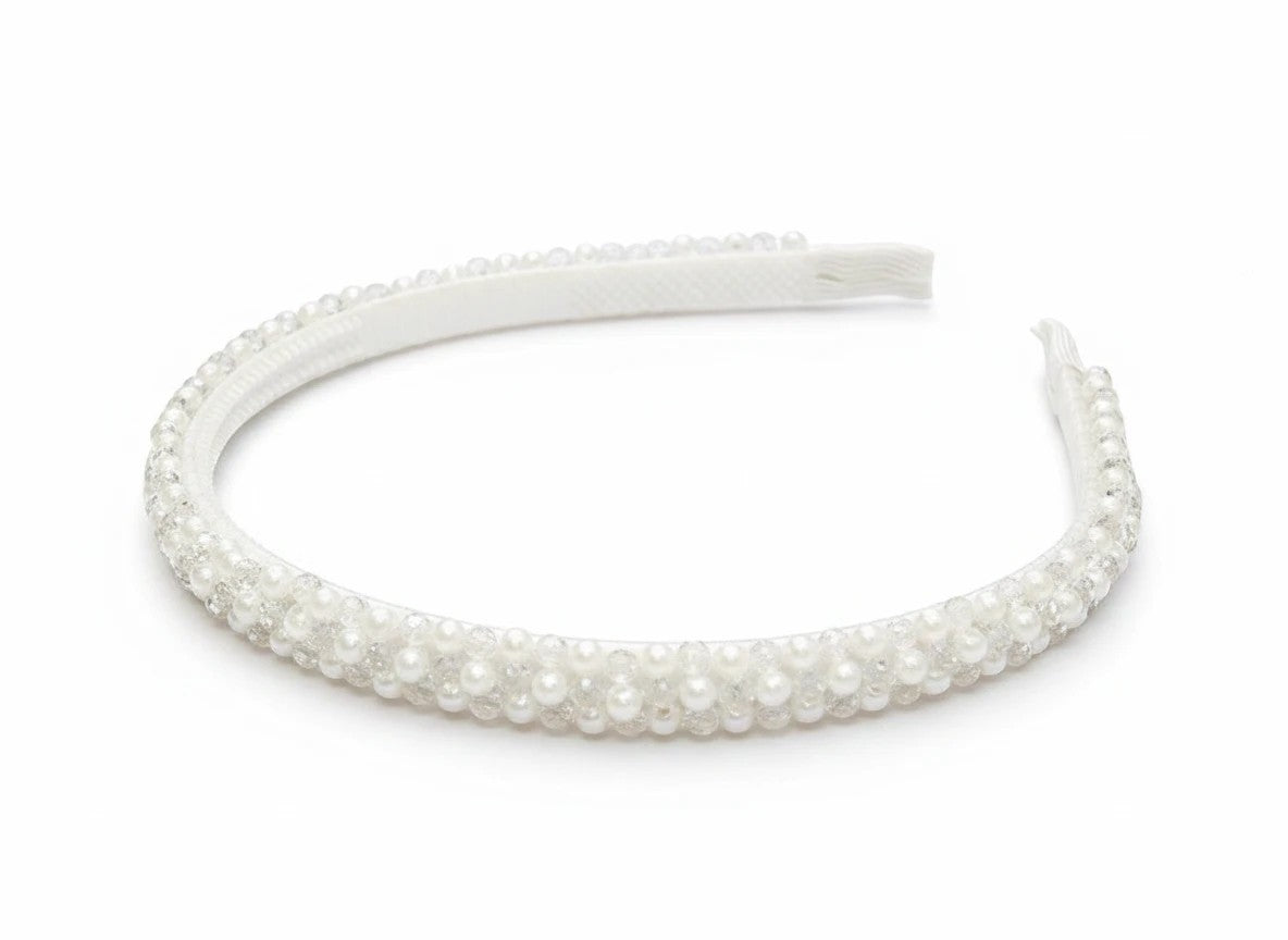 Stork And Baby white girls Alice band featuring elegant pearl and clear bead embellishments for special occasions.