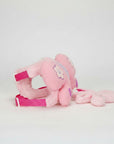 Stork And Baby pink plush butterfly harness with flower embroidery and adjustable straps.